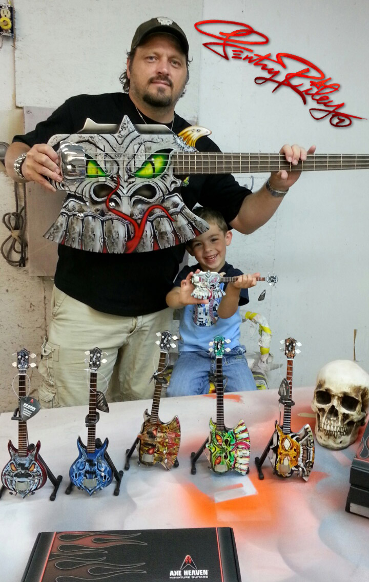 Gentry Riley and His Son with Custom Miniature Guitar Replicas by AXE HEAVEN®